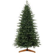 Green 7ft hinged artificial Christmas tree on a wooden cross stand, studio shot