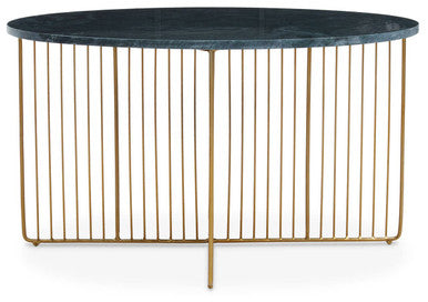 Green marble and gold round coffee table on a plain studio background