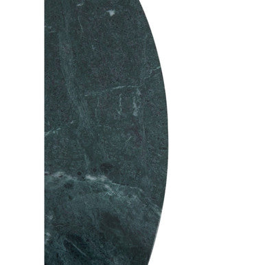 Detail of the gold-finish iron frame where it meets the marble top