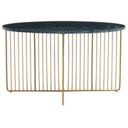 Green marble coffee table shown from above with the gold frame visible beneath