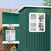 Close-up of the shed's roof air vents and white four-pane window on the green steel wall