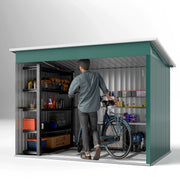 Cutaway view of the shed interior with a man wheeling a bicycle past shelves of tools