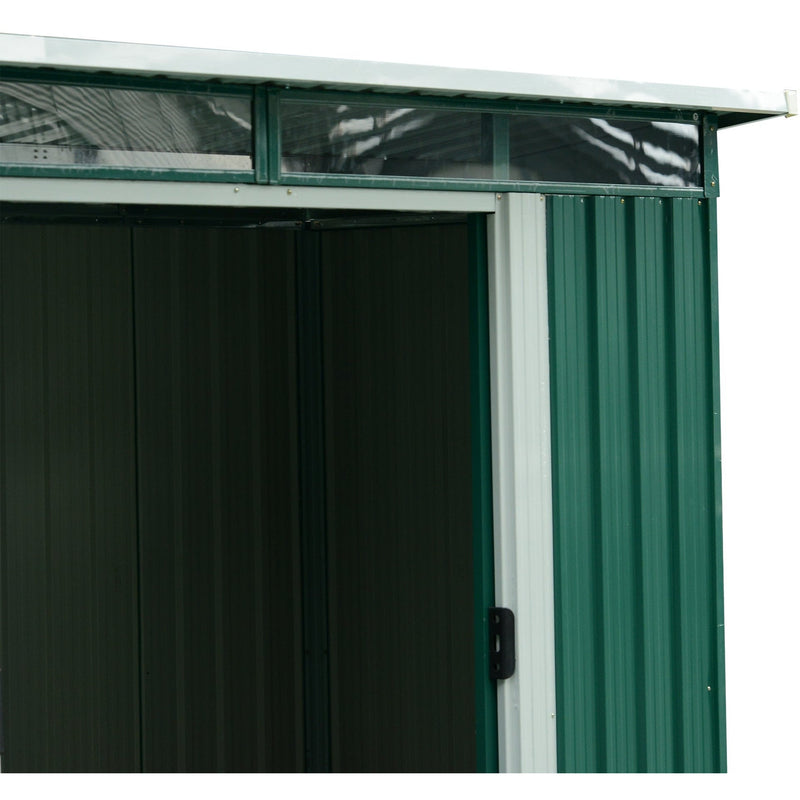 Close-up of the clear polycarbonate window panels running along the top of the shed's front wall