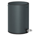 Greenish grey steel pedal bin with the lid closed on a white background