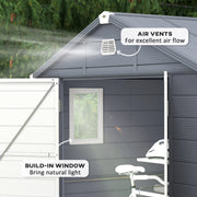 Close-up of the gable air vent and the built-in window that lets natural light into the shed
