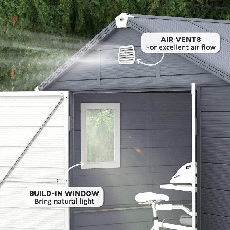 Close-up of the gable air vent and the built-in window that lets natural light into the shed