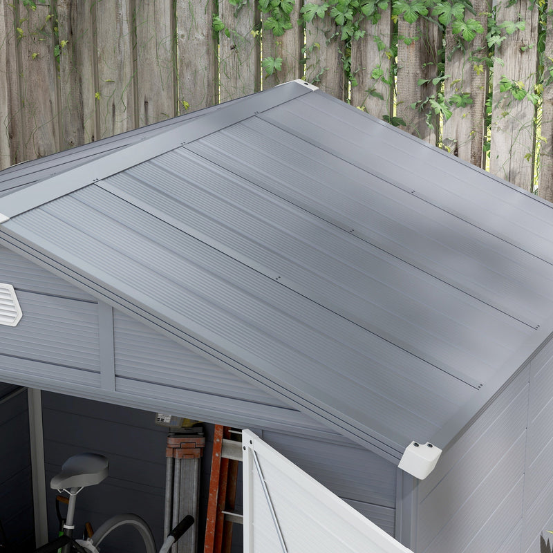 Overhead view of the shed's grey apex roof panels and ridge line