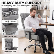 Man sitting in the grey office chair with callouts for 250 kg capacity and 55 x 52 cm seat