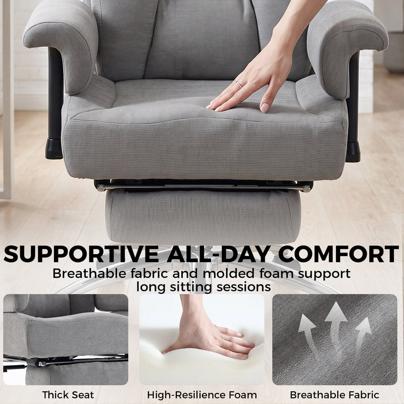 Hand pressing the thick padded seat of the grey office chair with comfort callouts