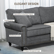 Rolled arm and nailhead trim detail on grey polyester fabric sofa