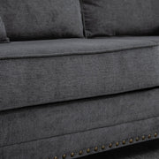 Close-up of back cushion stitching and piping detail, grey sofa
