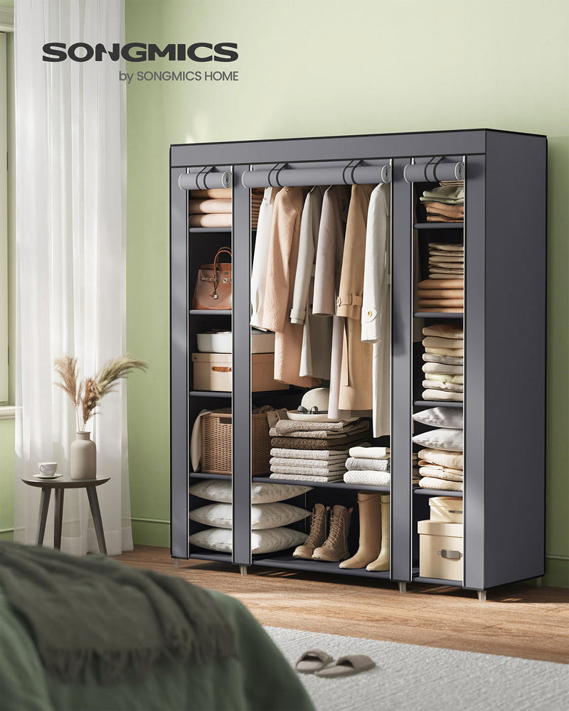 Grey fabric wardrobe styled in a bedroom beside a bed and a window