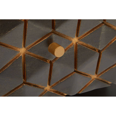 Close-up of the gold-finish iron frame and its joint to the wooden top