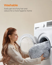 Dog bed cover being placed in a washing machine to show it is machine washable