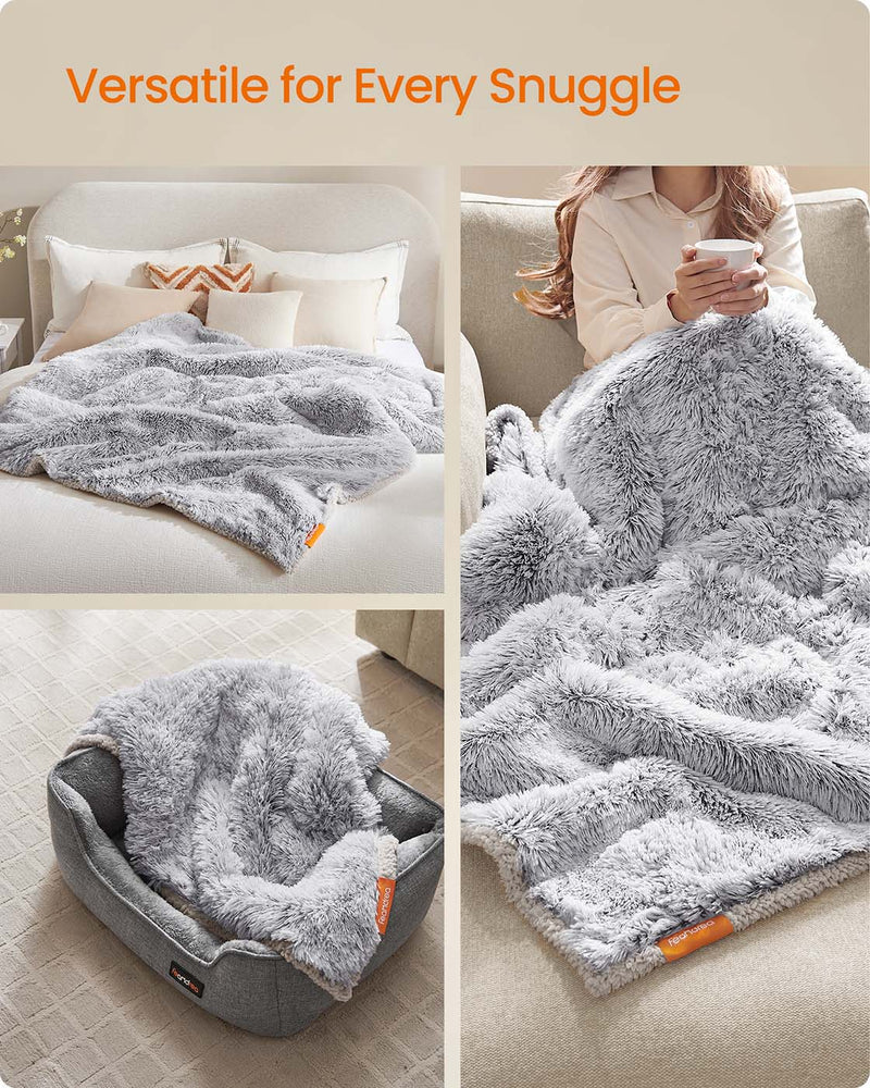 Grey Ombre Dog Blanket shown in use on a bed, pet bed and sofa