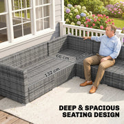 Man seated on the rattan loveseat with 132 cm and 66 cm seat measurements and deep seating text