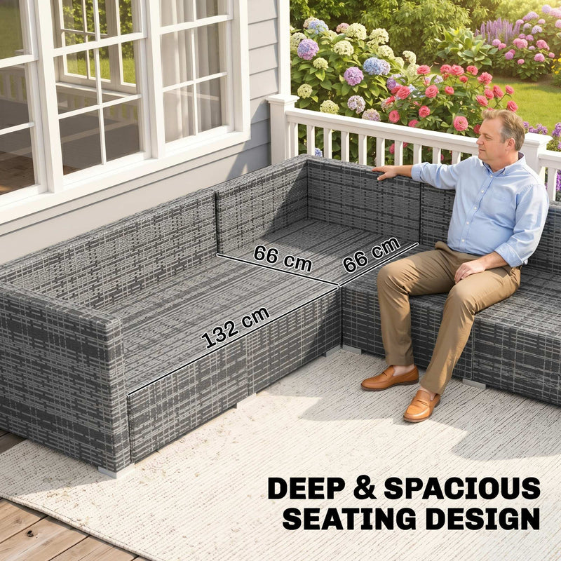 Man seated on the rattan loveseat with 132 cm and 66 cm seat measurements and deep seating text