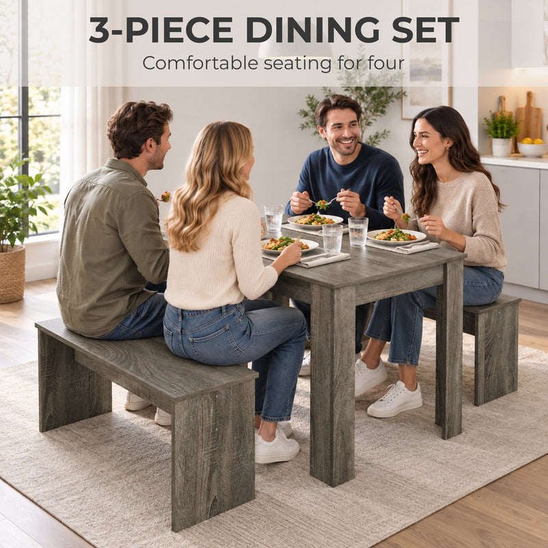Four people eating at the table with two benches in a bright dining area