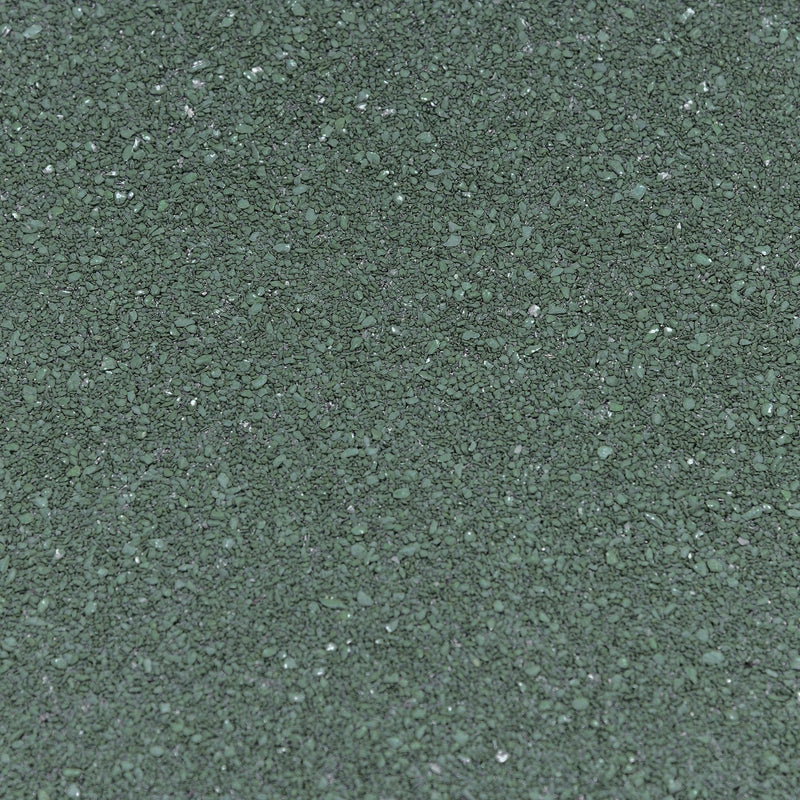 Close-up of the green asphalt granules covering the shed roof