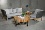 Grey woven rope sofa shown as a living room centrepiece
