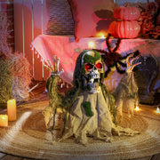 Half-body skeleton prop displayed indoors on a rug surrounded by Halloween party decor