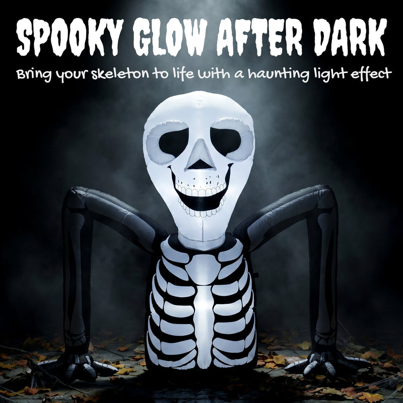 Ground crawling skeleton inflatable glowing white against a dark background