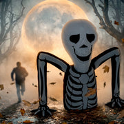 Skeleton inflatable glowing outdoors at night under a full moon