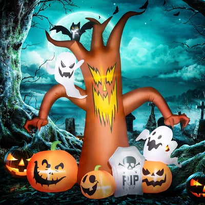Outsunny inflatable Halloween tree lit up at night in a spooky graveyard lifestyle scene