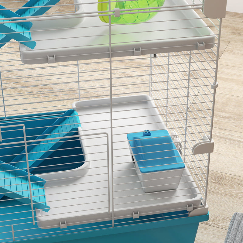 Close-up of the hut and food dish sitting on one of the cage's tiers