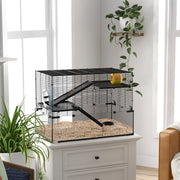 Hamster cage with glass base and multi-level platforms styled in a room setting