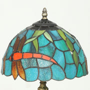 Close-up of the dragonfly stained glass shade