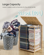 Capacity comparison showing 110 litres of folded laundry beside two overflowing plastic bins
