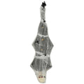 Hanging Halloween cocoon corpse wrapped in white webbing with fake spiders on a white background