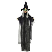 Hanging Halloween witch decoration in a black robe with green light-up eyes on a white background