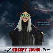 Hanging witch decoration in mist with speech bubbles showing the phrases she says