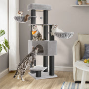 Close-up of the self-warming pad and built-in groomer on the dove grey cat tree