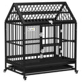Black heavy duty steel dog crate with a pointed roof, front door and four wheels on a white background