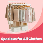 Close-up of the rack fully loaded with clothes and storage boxes on the bottom shelf