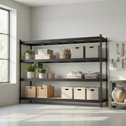 Black shelving rack in a bright white room with baskets, boxes and folded towels