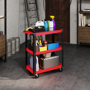 Tool trolley holding cleaning products, a toolbox and a storage case on a concrete garage floor