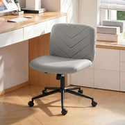 Grey desk chair positioned at a home office desk