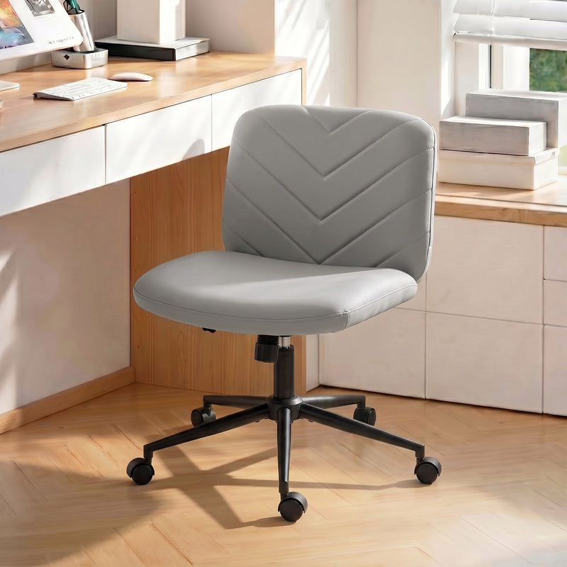 Grey desk chair positioned at a home office desk