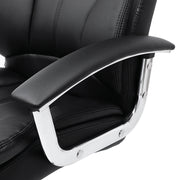 Close-up of the padded armrest and its curved metal support arm