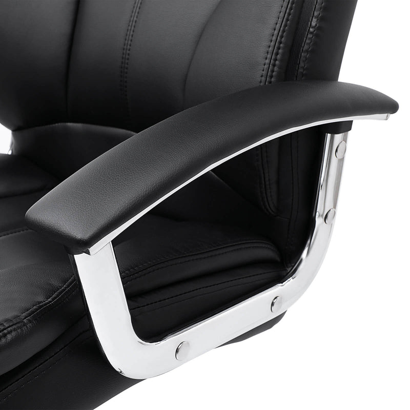 Close-up of the padded armrest and its curved metal support arm