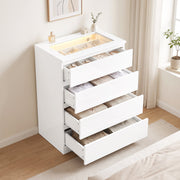 All four drawers open showing folded clothing storage in the white gloss chest of drawers