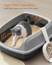 Cat inside the litter box showing the 19.5 cm high sides that contain litter scatter