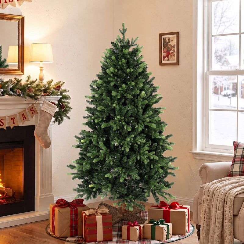 5ft Christmas tree beside a fireplace with wrapped gifts on a tree skirt