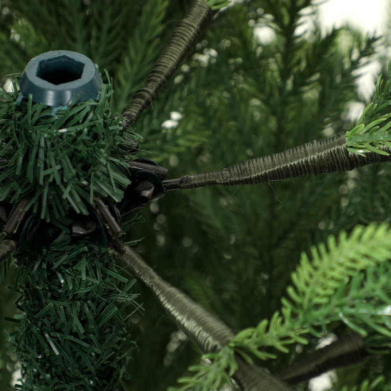 Macro close-up of a hinged branch joint and PE needles on the 5ft artificial tree