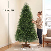 7ft Christmas tree next to a woman with size labels showing 2.1 m height and 1.25 m width