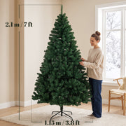 Dimensions of the 7ft Christmas tree: 2.1 m high and 1.15 m wide, with a woman shaping the branches